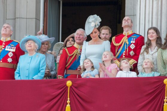 Meghan and Harry take a back seat as William, wife Kate and their children join Charles on balcony at Buckingham Palace for Trooping the Colour in 2018