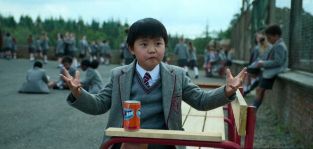 Schoolboy at fictional Crunchem Hall with vintage Irn-Bru in one of the scenes featuring the drink from Matilda the Musical