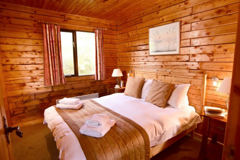 It doesn't get cosier than the bedroom inside Leny Estate's Leny Lodge.