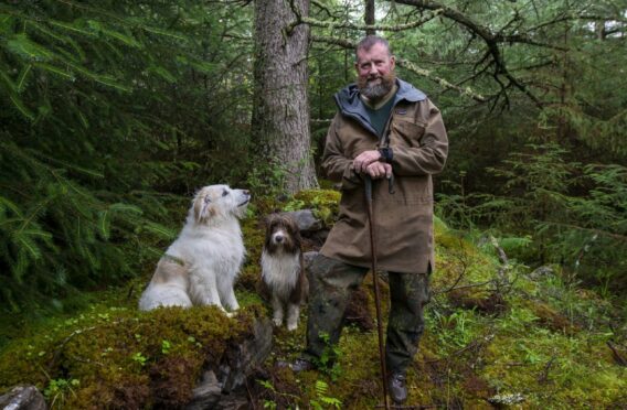 Duncan MacKenzie with his two dogs charts the forgotten villages