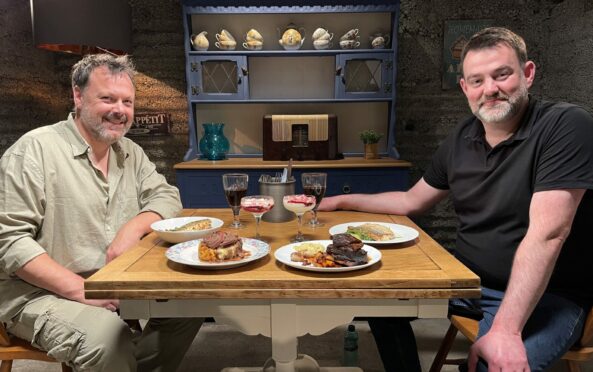 Uisdean Macleod and Ruairidh Munro enjoy some of their home cooking dishes