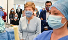 Nicola Sturgeon and Humza Yousaf visit a hospital in 2021