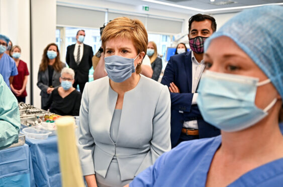 Nicola Sturgeon and Humza Yousaf visit a hospital in 2021