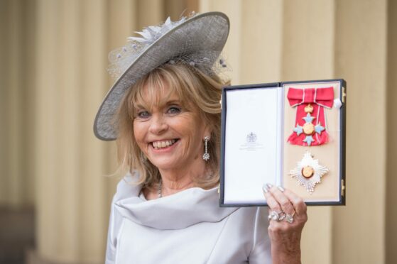 Ann Gloag is made a dame at Buckingham Palace in 2019.