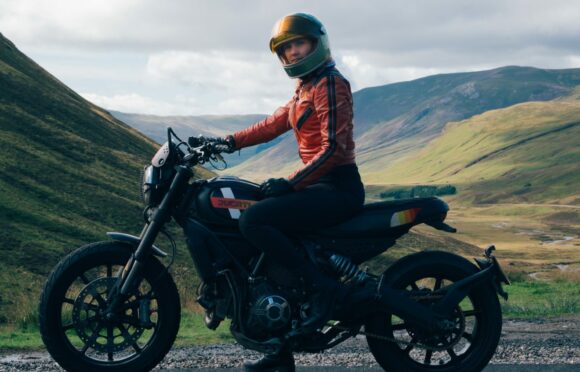 Biking enthusiast Dani Hair on her Ducati at the Devil’s Elbow Viewpoint, Cairnwell Pass, Glenshee,