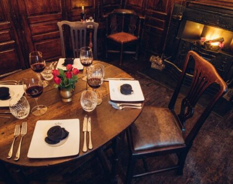 Robert Burns table at The Globe Inn set up for Burns Night in Dumfries