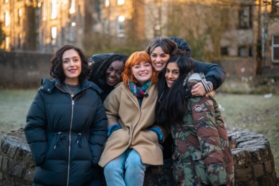 Moonset cast at the Witches’ Well in Paisley, from left: Zahra Browne, Cindy Awor, Leah Byrne, Hannah Visocchi, and Layla Kirk