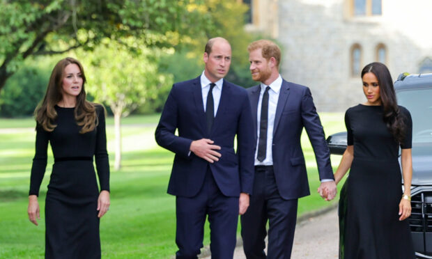Meeting the public at Windsor after the Queen’s death in September, William and his wife Kate share a moment with his brother Harry and his wife Meghan before the couple returned home to California