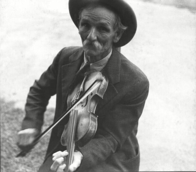Fiddlin’ Bill Henseley, a mountain fiddler in North Carolina in 1937, just one of the musicians influenced by Scots traditional music  