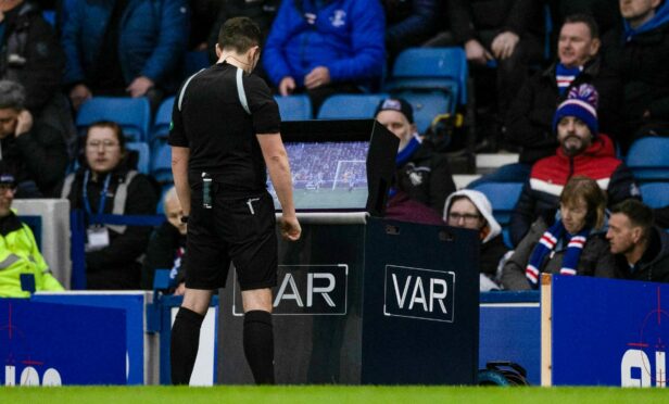 Referee David Munro reviews the “possible handball” by Rangers’ Antonio Colak before awarding a penalty to Partick Thistle at Ibrox last Sunday