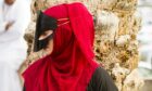 The rules of modesty in Oman mean that women must wear veils.