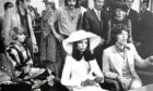 Bianca Jagger in famous white suit marries Mick in St Tropez.