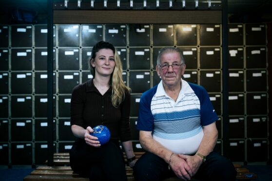 Bowler Cassy Kelly, with her grandfather, Alastair Ferguson