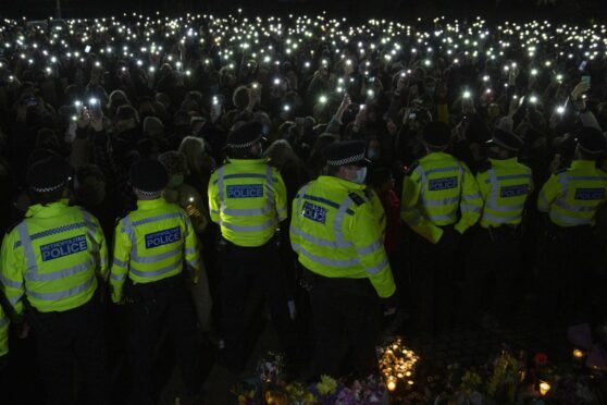 Met officers face down protesters at Clapham Common after forcing a vigil for Sarah Everard, who was murdered by a serving officer, to be cancelled during lockdown in London in 2021