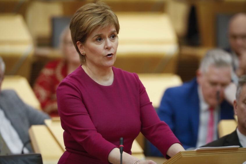 First Minister Nicola Sturgeon making a statement to Scottish Parliament apologising for historical forced adoption