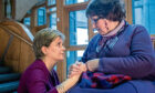Former First Minister Nicola Sturgeon, meeting Marion McMillan, after making an apology statement on behalf of the Scottish Government, regarding historical forced adoptions.