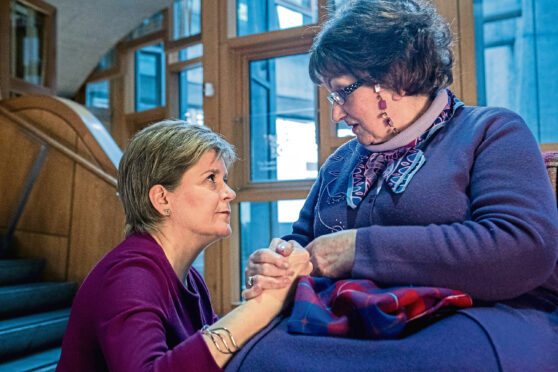 Former First Minister Nicola Sturgeon, meeting Marion McMillan, after making an apology statement on behalf of the Scottish Government, regarding historical forced adoptions.