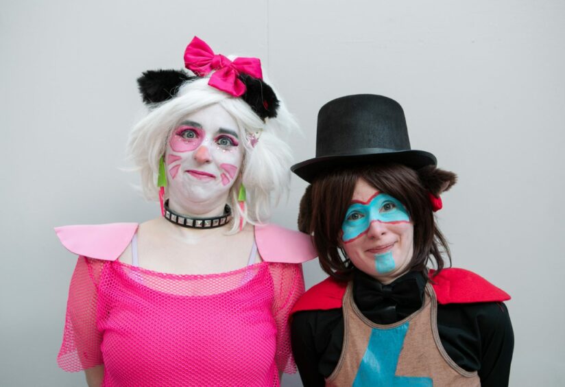 AJ, 33, from Dundee, dressed as Glamrock Chica, and Kimmi, 35, from Dundee, dressed as Glamrock Freddy