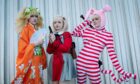 Becostumed fans pay homage to their comic book icons at the annual Comic Con at Glasgow’s SEC yesterday. They include, from left, Sam Stevenson, 16, dressed as Hiyoko Saionji; Sam Jarvis, 17, dressed as Chisato Nishikigi, and Lils Hunter, 18, as Popee the Performer