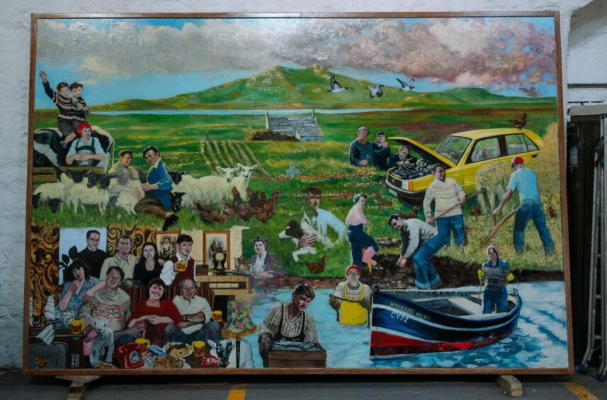 The mural depicting scenes of an island childhood at the garage in Port Glasgow