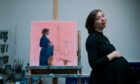 Mollie Hinshelwood with her portrait by Lesley Banks in the artist’s studio in Glasgow