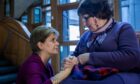 Nicola Sturgeon meeting campaigner Marion McMillan, after making an apology statement on behalf of the Scottish Government