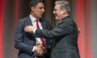 Anas Sarwar and Sir Keir Starmer shake at the Scottish Labour Party Conference