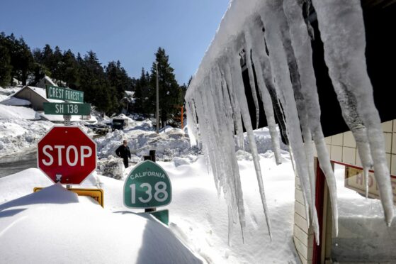 Homes and roads covered by the snowfall in Crestline, California, which has already been hit by severe wintry weather