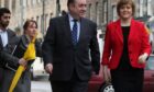 Humza Yousaf, the continuity candidate in the leadership race, on left, with Liz Lloyd, the FM’s former chief of staff who has been helping his campaign, Alex Salmond and Nicola Sturgeon in 2011