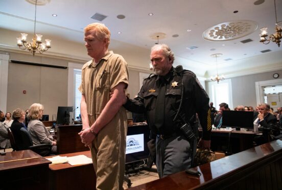 Alex Murdaugh is led from court in South Carolina after being sentenced on Friday