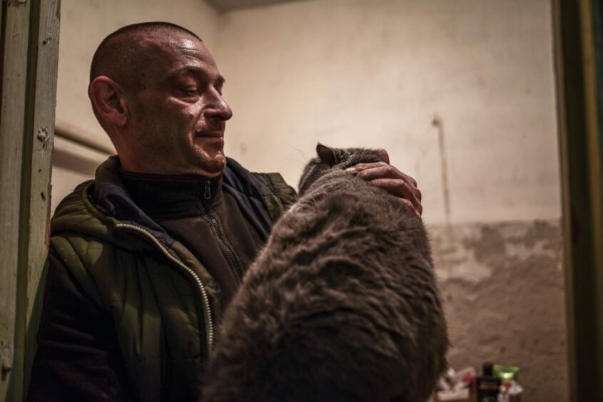 Aleksandr, with his cat
