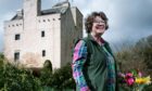Dr Janet BrennanInglis in the grounds of Barholm Castle near Castle Douglas, which she has lovingly restored with husband John