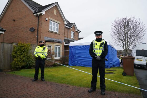 Police outside the home of former chief executive of the Scottish National Party Peter Murrell