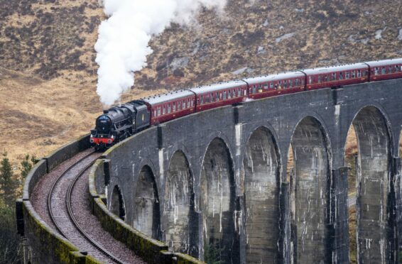Jacobite steam train on Glenfinnan Viaduct is known by fans as the Hogwarts Express