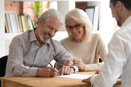 A photo of a couple trying to avoid paying care home fees by meeting estate planning expert