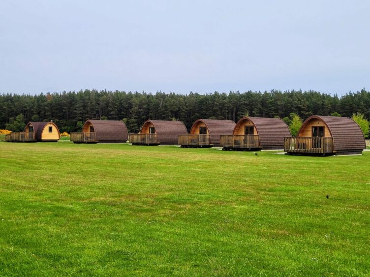 Cabins at Evelix Pods holiday park in Dornoch, Scotland.