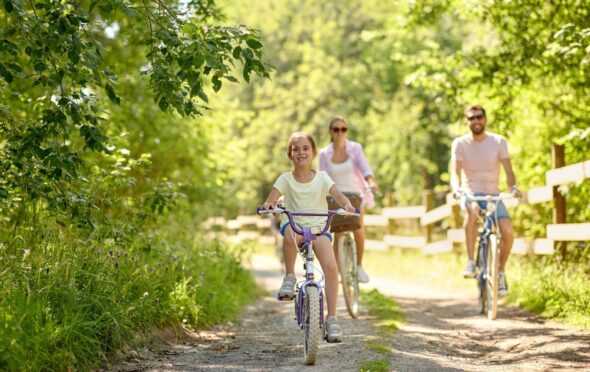 Family cycling on holiday