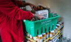 Care workers are turning to foodbanks like this one at St Gregory’s Church in Maryhill, Glasgow