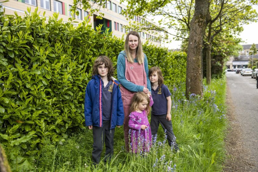 Claire Larkin with children Elliot, nine, Olive, three, and Isaac, six