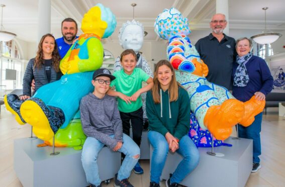 The Kitchens with Oor Wullie statues at DC Thomson’s Meadowside offices in Dundee, from left: Parents Sarah and James; Jackson, Caden and Gracie; and grandparents John and Glynis