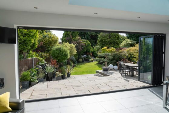 Home and garden makeover featuring bifold doors.