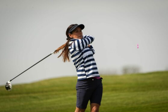 Golfer at end of swing