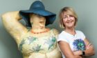 Kaye Adams stands next to Irene, the sculpture she has had since the 1980s