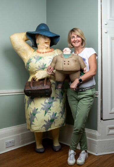 Kaye with Irene and another sculpture by the same artist, Otto