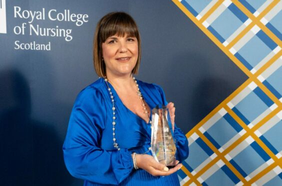 Fiona Bruce with her Sunday Post People's Choice Nurse of the Year award.