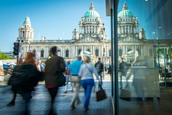 Motion blurred shot of pedestrians on Belfast high street