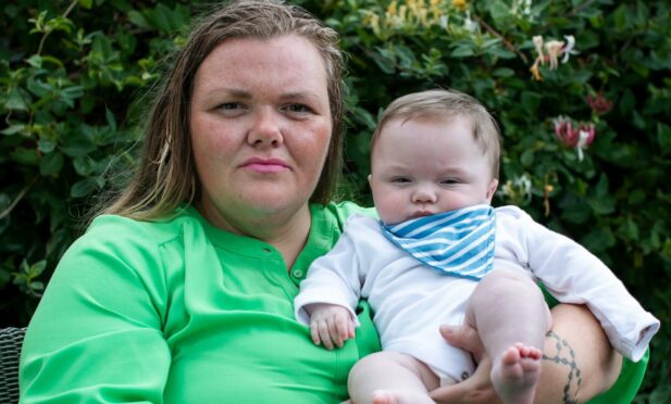 Carrie O'Donnell with baby son Oliver who is now thriving after his traumatic birth.