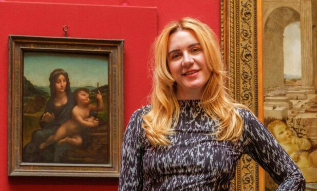 Olivia Graham at the National Galleries of Scotland with the Madonna of the Yarnwinder