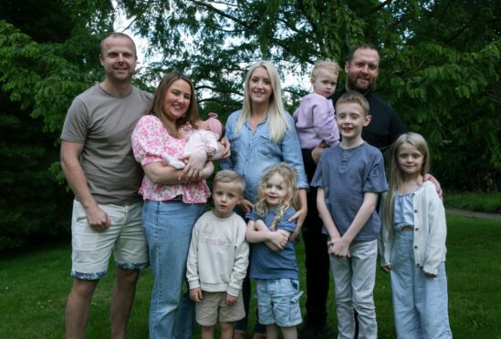 Left to right: Stuart and Ami Geddes, baby Connie, Camdyn Geddes four, Jennifer Halliday, with her children Jax, four, Blake, two, Brodie, eight, husband Jamie and Blair, seven.