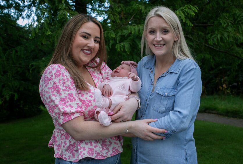 Ami Geddes and Jennifer Halliday, with baby Connie.